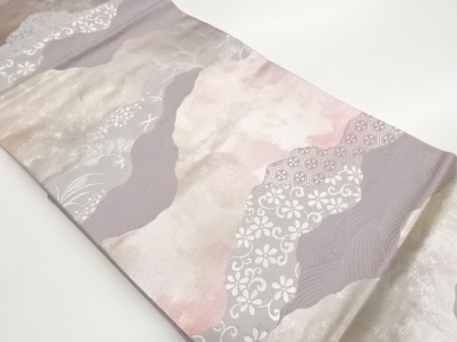 引箔亀甲・花唐草に荒波・鳥模様織出し名古屋帯